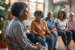 © alfi - Empowering female therapist leading support group circle for senior people. Compassionate interaction.