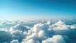 © AkuAku - Aerial view of fluffy clouds and clear sky