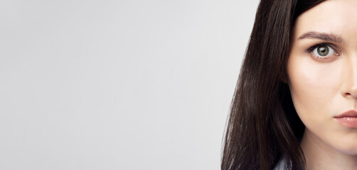 Leinwandbilder - Portrait Of Woman Face Looking At Camera Over White Studio Background. Human Cloning And ID Data. Closeup