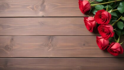 Wall Mural - Top view of red roses on wooden table with copy space.