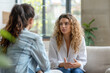 © Patcharaphon - Woman psychologist talking with patient in her office. Psychological health and consultation concept