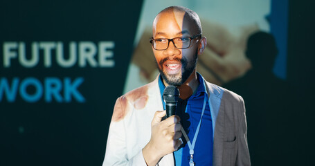 Aufkleber - Conference, future and speech with black man on stage for business seminar or workshop. Mic, professional and work with speaker by podium for presentation or public speaking event in auditorium