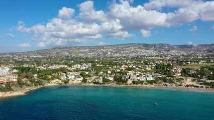 Wall Mural - Aerial panoramic view of Coral bay beach, Cyprus. Overhead view of Coral Bay beach, Peyia village, Paphos district, Cyprus. Aerial view of Coral Bay beach in Peyia village, Cyprus.