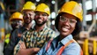 © Pornarun - Diverse team of industrial workers wearing hard hats and safety glasses, smiling confidently.