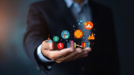 businessman hand holding color business and financial icons