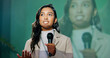 © WesSide/peopleimages.com - Conference, presentation or seminar and public speaking woman with microphone on stage for development speech. Business, podium and tradeshow with Indian motivational speaker in corporate auditorium