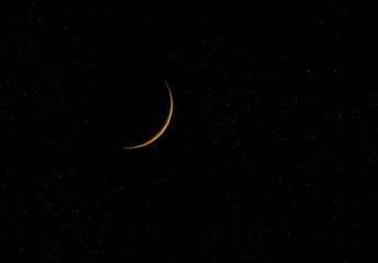 Wall Mural - waxing crescent moon 3% taken july 7, 2024 above ottawa, canada against a starry black background.