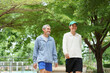 © Verin - different age friends,asian senior man and middle aged male enjoy talking while exercise in the park,concept of people lifestyle,exercise,relaxing,friendship,social interaction