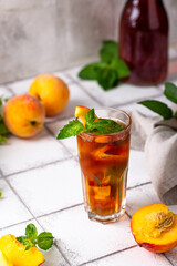 Wall Mural - Cold ice tea with peach and mint