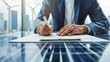 © keetazalay - A business executive signing a contract with a renewable energy provider in a sleek office with views of solar panels and wind turbines symbolizing a commitment to green energy