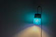 © avdyachenko - Background: wall and homemade paper blue lamp