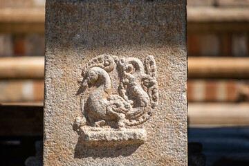 Wall Mural - An intricate carving of a bird on a column at the ancient Jain temple in Shravanabelagola.