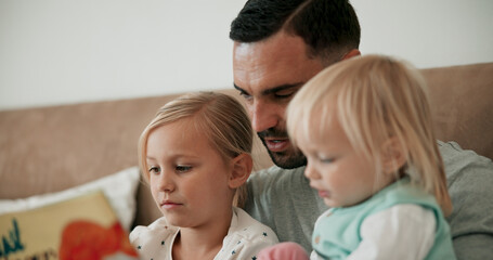 Wall Mural - Father, children and reading book in bed for storytelling, literature and bonding at bedtime. Home, daddy and daughters learning together for love, language and support or fiction for fairytale