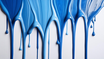 Vibrant blue paint dripping on white background. Fresh bright paint flowing down. Abstract pattern.