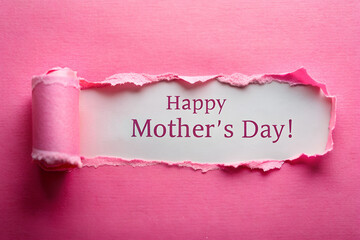 Wall Mural - Top view of happy mother's day on pink torn paper. Happy Mother's Day Concept.