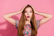 © deagreez - Photo of stunned lovely girl with straight hairdo dressed print shirt palms on head staring at promo isolated on pink color background
