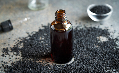 Poster - A bottle of black cumin or Nigella seed oil