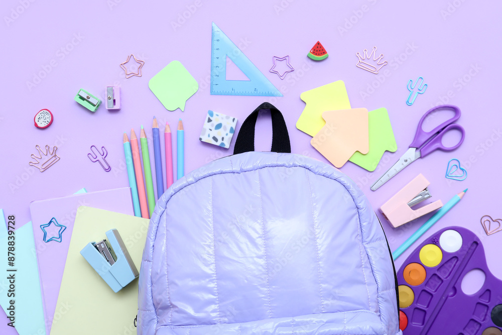 Composition with stylish school backpack and different stationery on lilac background, closeup