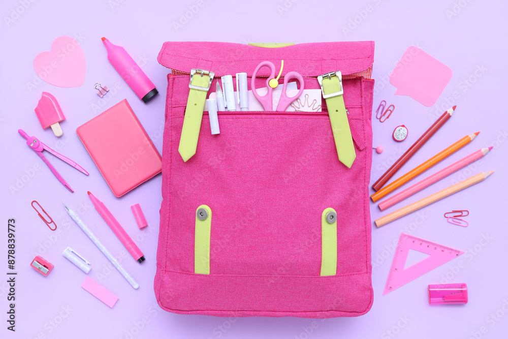 Composition with pink school backpack and different stationery on lilac background