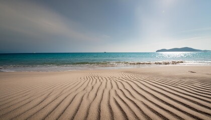 Canvas Print - summer vacation and travel holiday concept sand beach and blurred seascape view blue sky in background