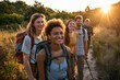 © senyumanmu - Happy group of friends hiking together on a summer day