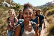 © senyumanmu - Happy group of friends hiking together on a summer day