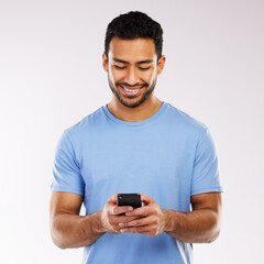 Poster - Asian man, studio and happy with smartphone on email or communication on white background. Isolated, online and smile or satisfied on website with mobile or notification and text for loan approval