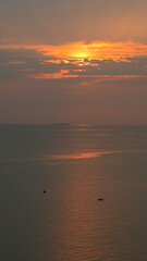 Wall Mural - beautiful view of golden sea and sky in the evening, natural background