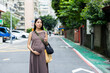© leungchopan - Pregnant woman walk in the Taipei city
