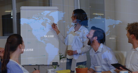 Poster - Multiple numbers over a world map against african american woman giving a presentation at office