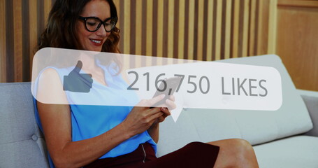 Poster - Image of social media like notification over smiling caucasian woman using smartphone