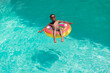 © Wavebreak Media - African American boy enjoys a sunny day in the pool