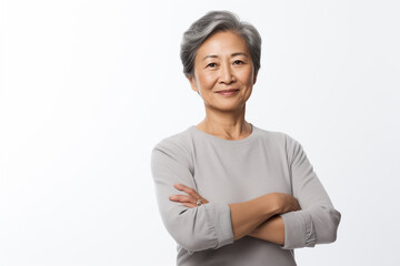 Wall Mural - portrait of a asian mature woman on white background