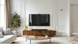 © Syahrul Zidane A - Cabinet for TV on the white plaster wall in living room with sofa and accessories decoration