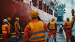 © Matthias - Maritime safety drill on cargo ship with crew donning life jackets