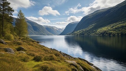 Sticker -  Tranquil mountain lake under a clear sky