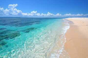 Wall Mural - Tranquil Turquoise Waters Lap Against White Sandy Beach on a Sunny Day