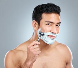 Wall Mural - beauty, portrait and razor with masculine man in studio on gray background for cosmetic wellness. de