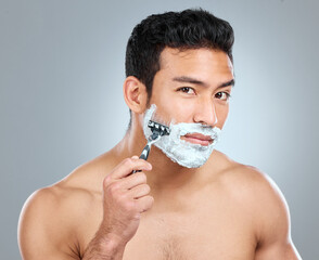 Poster - Beauty, shaving and portrait of masculine man in studio on gray background for cosmetic wellness. Dermatology, natural and razor with face of confident person in bathroom for hair removal or hygiene