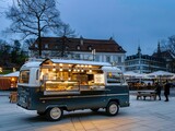 Vintage Food Truck in a European City Square at Dusk