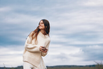 Poster - Mountain Woman: A Smiling Adventurous Traveler Capturing Selfie with Smartphone in Cyberspace