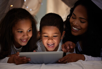 Poster - Bed, mother and children with tablet for connection, education and e learning together for bonding at home. People, mom and kids with digital for streaming cartoon, game and video at night in house