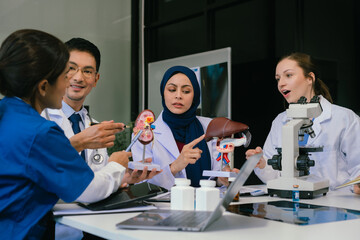 Wall Mural - doctor team, analysis the blood test examination results and medication usage of the patient on the 