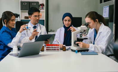 Wall Mural - doctor team, analysis the blood test examination results and medication usage of the patient on the 