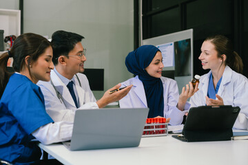 Wall Mural - doctor team, analysis the blood test examination results and medication usage of the patient on the 