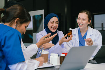Wall Mural - doctor team, analysis the blood test examination results and medication usage of the patient on the 