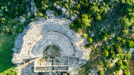 Wall Mural - Patara. Ruins of the ancient Lycian city. The theater located near the beach in Patara is the old Amphitheater. Aerial view shot with drone. Antalya, Turkey.