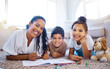 © peopleimages.com - Drawing, relax and portrait of mother with children on floor in living room for creative learning. Smile, bonding and mom teach kids with crayons and color book for motor skills development at home