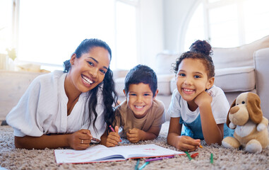 Poster - Drawing, relax and portrait of mother with children on floor in living room for creative learning. Smile, bonding and mom teach kids with crayons and color book for motor skills development at home