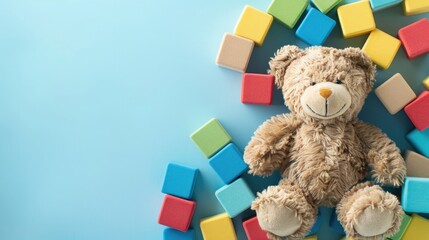 Children s Toy Banner with Teddy Bear and Colorful Blocks on Light Blue Background